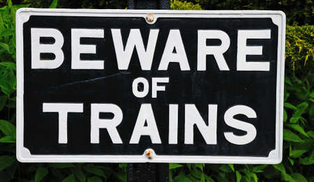 Old fashioned Beware of Trains sign, Hampton Loade, Shropshire, England, UK, Western Europe   の写真素材