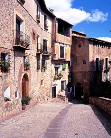 Traditional townhouses along a cobbled street, Albarracin, Teruel Province, Aragon, Spain, Western Europe の写真素材