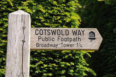 Wooden Cotswold Way signpost giving directions to Broadway Tower, Broadway, Cotswolds, Worcestershire, England, UK, Western Europe の写真素材