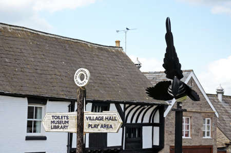 The magpie sculpture and fingerpost in Market Pitch, Weobley, Herefordshire, England, UK, Western Europe の写真素材
