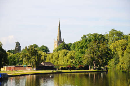 Stratford-upon-Avon, Uninted Kingdom - June 12, 2014 - View along the River Avon towards the Holy Trinity Church, Stratford-upon-Avon, Warwickshire, England, UK, Western Europe   のeditorial素材