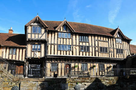 Warwick, United Kingdom - June 12, 2014 - Front view of the Lord Leycester Hospital along High Street  mainly fourteenth century , Warwick, Warwickshire, England, UK, Western Europe のeditorial素材
