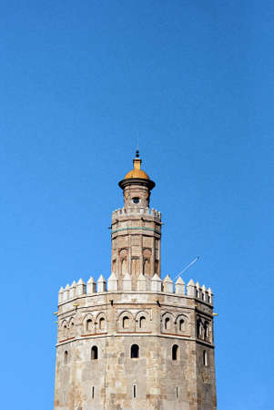 Golden tower of Torre del Oro in Seville, Spainの写真素材