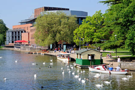 Stratford-upon-Avon, UK - May 18, 2014 - Royal Shakespeare Company Theatre along the River Avon, Stratford-Upon-Avon, Warwickshire, England, United Kingdom, Western Europe のeditorial素材