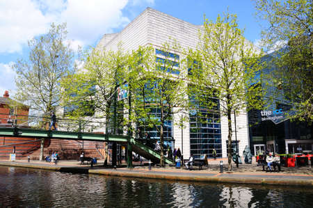Birmingham, UK - May 14, 2014 - Footbridge across the canal outside the rear of the ICC, Brindley Place, Birmingham, West Midlands, England, UK, Western Europe のeditorial素材