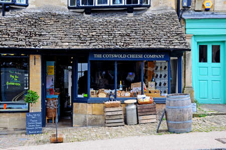 Burford, UK - June 17, 2014 - Traditional cheese shop along the High Street, Burford, Oxfordshire, England, UK, Western Europe のeditorial素材