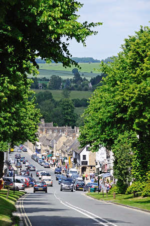 Burford, UK - June 17, 2014 - View down the hill towards the shops along the High Street, Burford, Oxfordshire, England, UK, Western Europe のeditorial素材