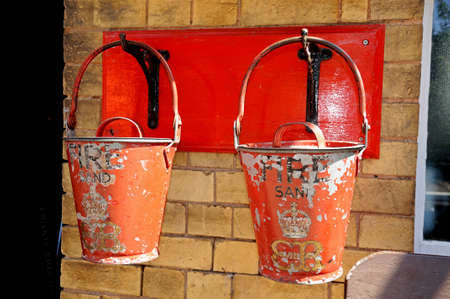 Old Retro Victorian fire sand buckets, Severn Valley Railway, Arley, Worcestershire, England, UK, Western Europe の写真素材