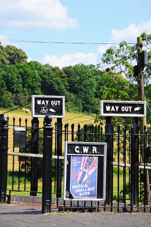 Highley, UK - July 10, 2014 - Old Retro way out signs and an old wartime poster, Severn Valley Railway, Highley, Worcestershire, England, UK, Western Europe のeditorial素材