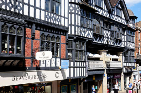 Tudor shops and buildings along Eastgate Street, Chester, Cheshire, England, UK, Western Europe.のeditorial素材