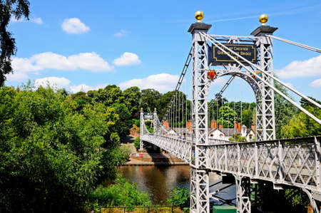 Chester, UK - July 22, 2014 - River Dee Suspension Bridge aka Queens Park Suspension bridge along the River Dee, Chester, Cheshire, England, UK, Western Europe.のeditorial素材