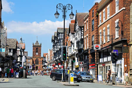 Chester, UK - July 22, 2014 - Buildings and shops along Bridge Street with St Peters church to the rear, Chester, Cheshire, England, UK, Western Europe.のeditorial素材