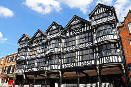 Chester, UK - July 22, 2014 - Front facade of the Grosvenor Shopping Centre along Bridge Street, Chester, Cheshire, England, UK, Western Europe.のeditorial素材