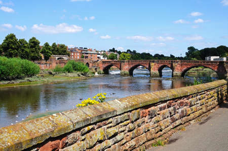Chester, UK - July 22, 2014 - View of Old Dee Bridge along the River Dee, Chester, Cheshire, England, UK, Western Europe.のeditorial素材