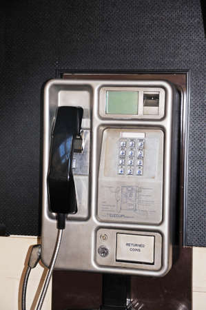 Derby, UK - July 17, 2014 - Public coin operated telephone in the Market Hall, Derby, Derbyshire, England, UK, Western Europe.のeditorial素材