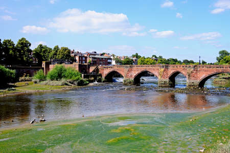 Chester, UK - July 22, 2014 - View of Old Dee Bridge along the River Dee, Chester, Cheshire, England, UK, Western Europe.のeditorial素材