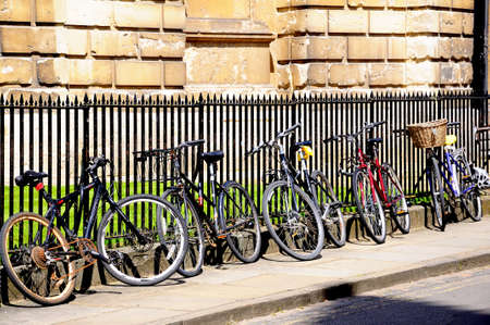 Oxford, UK - June 17, 2014 - Bicycles leaning against the railings outside Radcliffe Camera, Oxford, Oxfordshire, England, UK, Western Europe.のeditorial素材