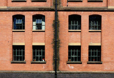Nottingham, UK - July 17, 2014 - Windows in an old Victorian building along the Nottingham and Beeston Canal city wharf, Nottingham, Nottinghamshire, England, UK, Western Europe.のeditorial素材