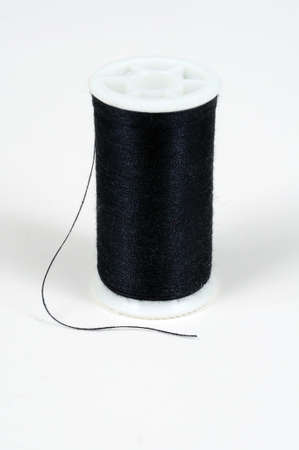 Spool of black cotton, England, UK, Western Europe.の写真素材