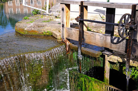 Cromford Mill (water powered cotton spinning mill) Sluice gate mechanism at Cromford Mill (water powered cotton spinning mill), Cromford, Derbyshire, England, UK, Western Europe.の写真素材