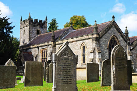 Ashford-in-the-Water, UK - September 7, 2014 - Holy Trinity Parish Church and churchyard,...