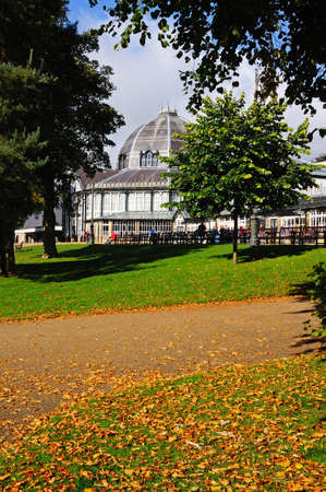 Buxton, UK - September 7, 2014 - Octagon Hall in the Pavilion Gardens with Autumn leaves in the...