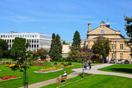 Cheltenham, UK - September 8, 2014 - Flowerbeds in the Imperial Gardens with the town hall on the right hand side, Cheltenham, Gloucestershire, England, UK, Western Europe.のeditorial素材