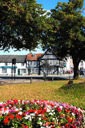 Evesham, UK - September 8, 2014 - Flowerbed with Ye Olde Red Horse pub to the rear, Evesham, Worcestershire, England, UK, Western Europe.のeditorial素材
