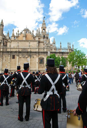Seville, Spain - April 7, 2009 - Members of El Cerro brotherhood marching band walking through the city streets during Santa Semama, Seville, Seville Province, Andalusia, Spain, Western Europe.のeditorial素材