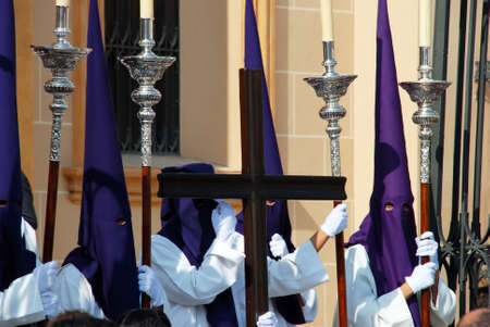 Malaga, Spain - April 5, 2009 - Members of the Salud Brotherhood standing outside the San Pablo (Saint Paul) church during Santa Semana week, Malaga, Malaga Province, Andalusia, Spain, Western Europe.のeditorial素材