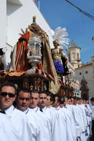 Malaga, Spain, - April 5, 2009 - Members of the Salutation brotherhood walking through the city...