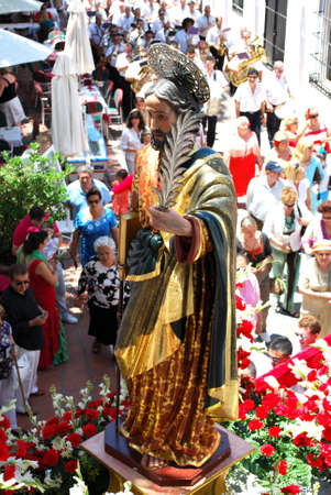 Statue of Saint Bernard on a float being carried through the town streets during the Romeria San Bernabe, Marbella, Costa del Sol, Malaga Province, Andalusia, Spain, Western Europe.のeditorial素材