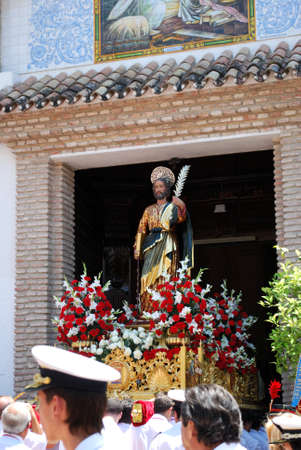 Statue of Saint Bernard on the float being carried into the church at the Romeria San Bernabe,...