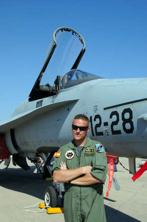 Pilot standing in front of a McDonnell Douglass F/A-18 Hornet of the Spanish Airforce at the second...