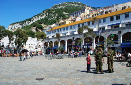 British soldiers and tourists in Grand Casemates Square, Gibraltar, United Kingdom, Western Europe.のeditorial素材
