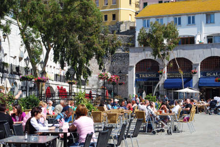 Tourists relaxing at pavement cafes in Grand Casemates Square, Gibraltar, United Kingdom, Western Europe.のeditorial素材