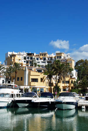 Boats in the inner harbour with apartments and restaurants to the rear, Puerto Cabopino, Costa del...