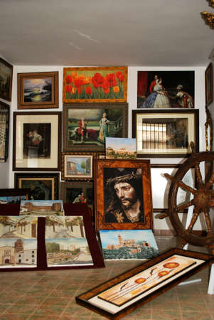 Paintings inside an art shop, Priego de Cordoba, Cordoba Province, Andalusia, Spain, Western Europe.のeditorial素材