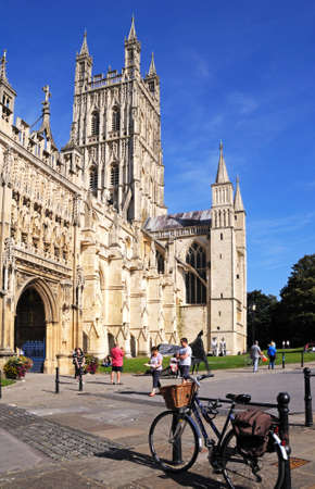 Cathedral church of St Peter and the Holy and Indivisible Trinity with a bicycle in the foreground, Gloucester, Gloucestershire, England, UK, Western Europe.のeditorial素材