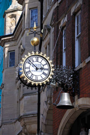 Bakers Jewellers clock along Southgate Street, Gloucester, Gloucestershire, England, UK, Western Europe.のeditorial素材