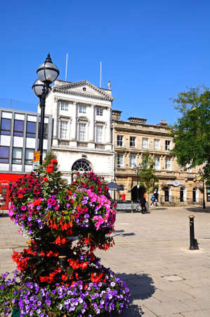 View of Market Square with pretty flowers in the foreground, Stafford, Staffordshire, England, UK, Western Europe.のeditorial素材