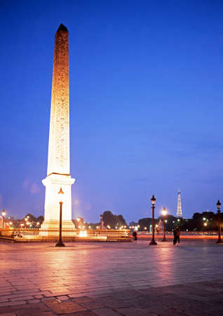 The Luxor Obelisk in the Place de la Concorde with the Eiffel tower to the rear at night, Paris, France, Western Europe.のeditorial素材