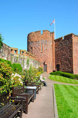 View of the sandstone castle tower with Spring flowers in the foreground, Shrewsbury, Shropshire, England, UK, Western Europe.のeditorial素材