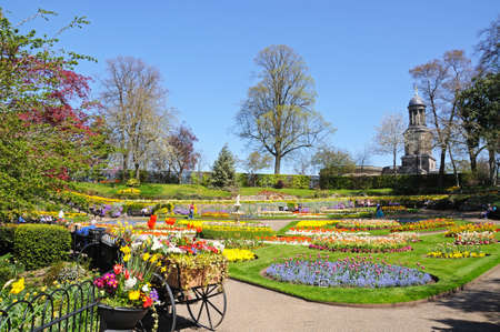 View of The Dingle formal garden in Quarry Park during the Springtime with St Chads church to the rear, Shrewsbury, Shropshire, England, UK, Western Europe.のeditorial素材