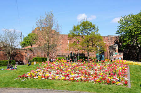 View of the sandstone castle with Spring flowerbeds in the foreground, Shrewsbury, Shropshire, England, UK, Western Europe.のeditorial素材