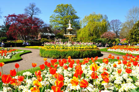 View of The Dingle formal garden with a fountain in the centre in Quarry Park during the Springtime, Shrewsbury, Shropshire, England, UK, Western Europe.のeditorial素材