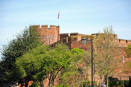 View of the sandstone castle tower with a British flag on top, Shrewsbury, Shropshire, England, UK, Western Europe.のeditorial素材