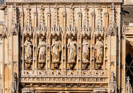 Religious sculpture detail on the Cathedral church of St Peter and the Holy and Indivisible Trinity, Gloucester, Gloucestershire, England, UK, Western Europe.の写真素材
