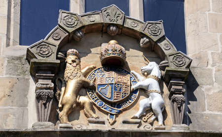Coat of Arms showing a Lion and a Unicorn on the front of Castle Gate Library, Shrewsbury, Shropshire, England, UK, Western Europe.のeditorial素材