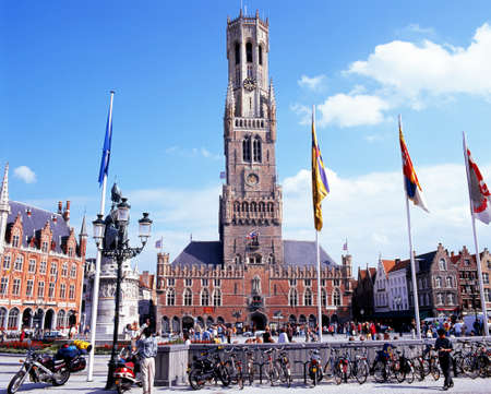 The Belfry in Market Square with bicycles in the foreground Bruges Belgium Western Europe.のeditorial素材